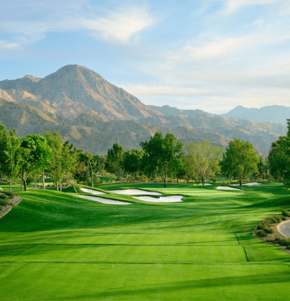View of Indian Wells Golf Course including mountains and trees in the background